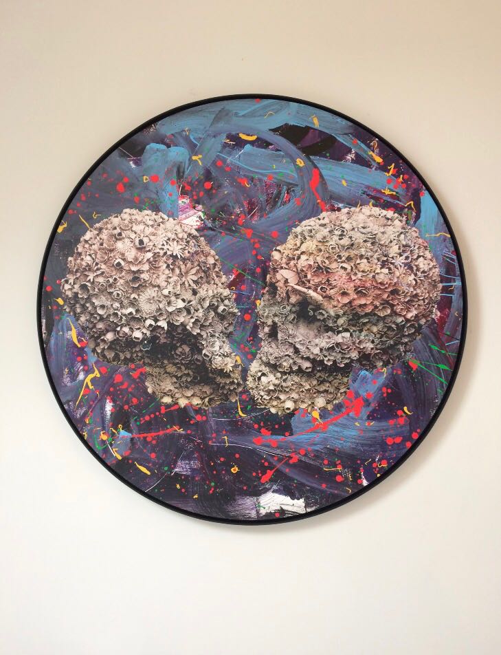Circular skull artwork by Jacky Tsai