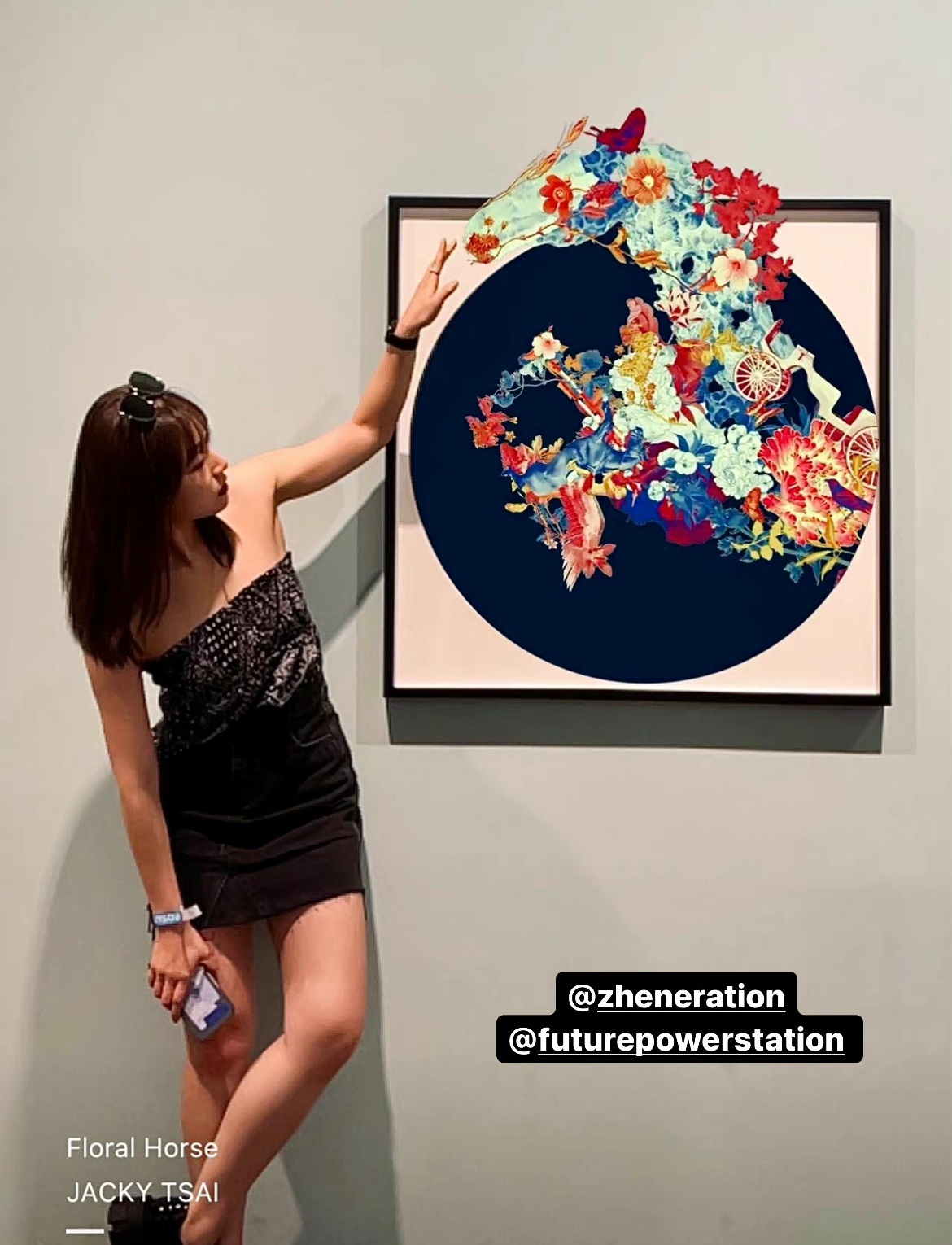 A visitor reaches out to the virtual Floral Horse through augmented reality