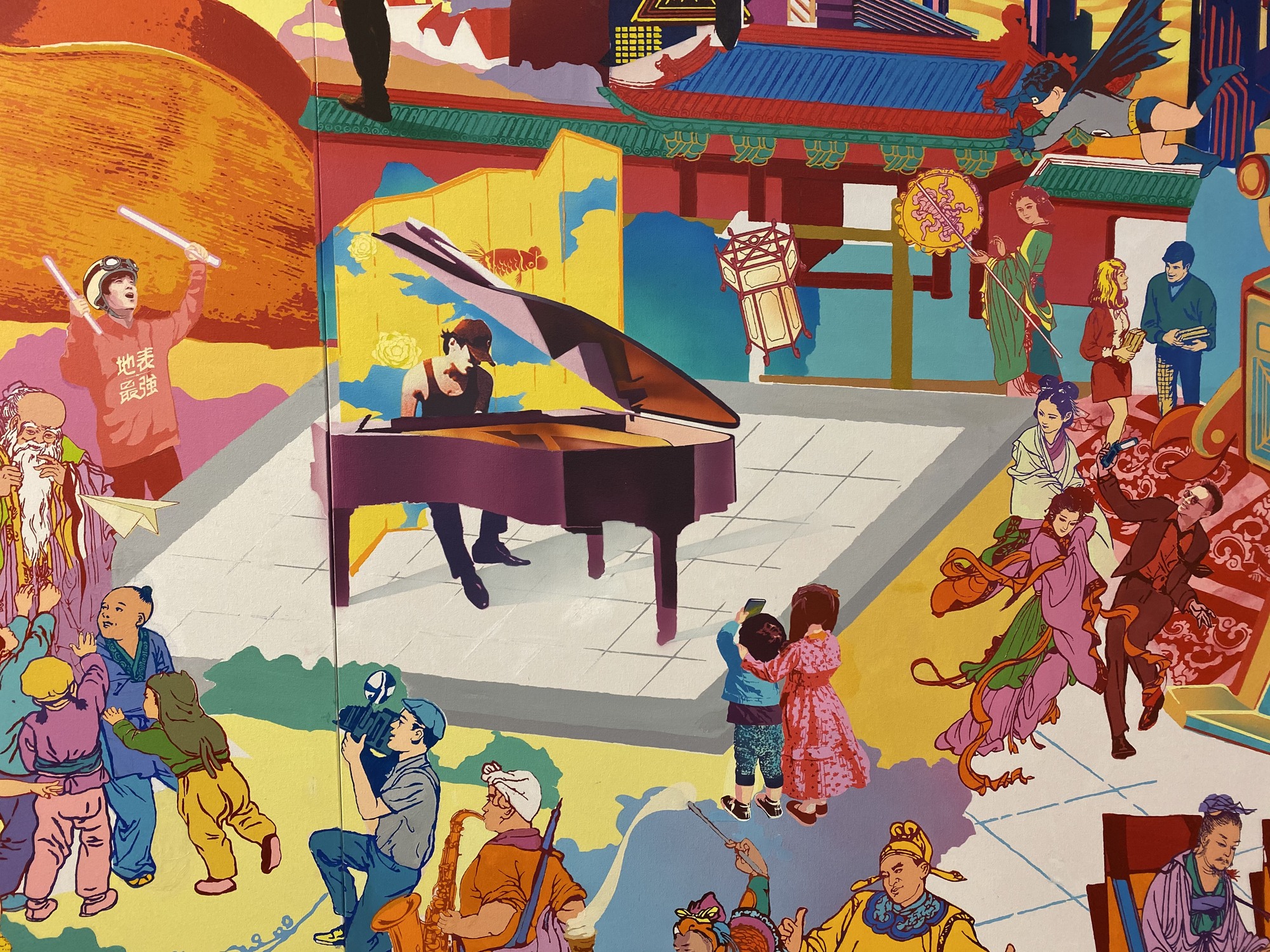 A close view of the piano and assembled characters in the painting
