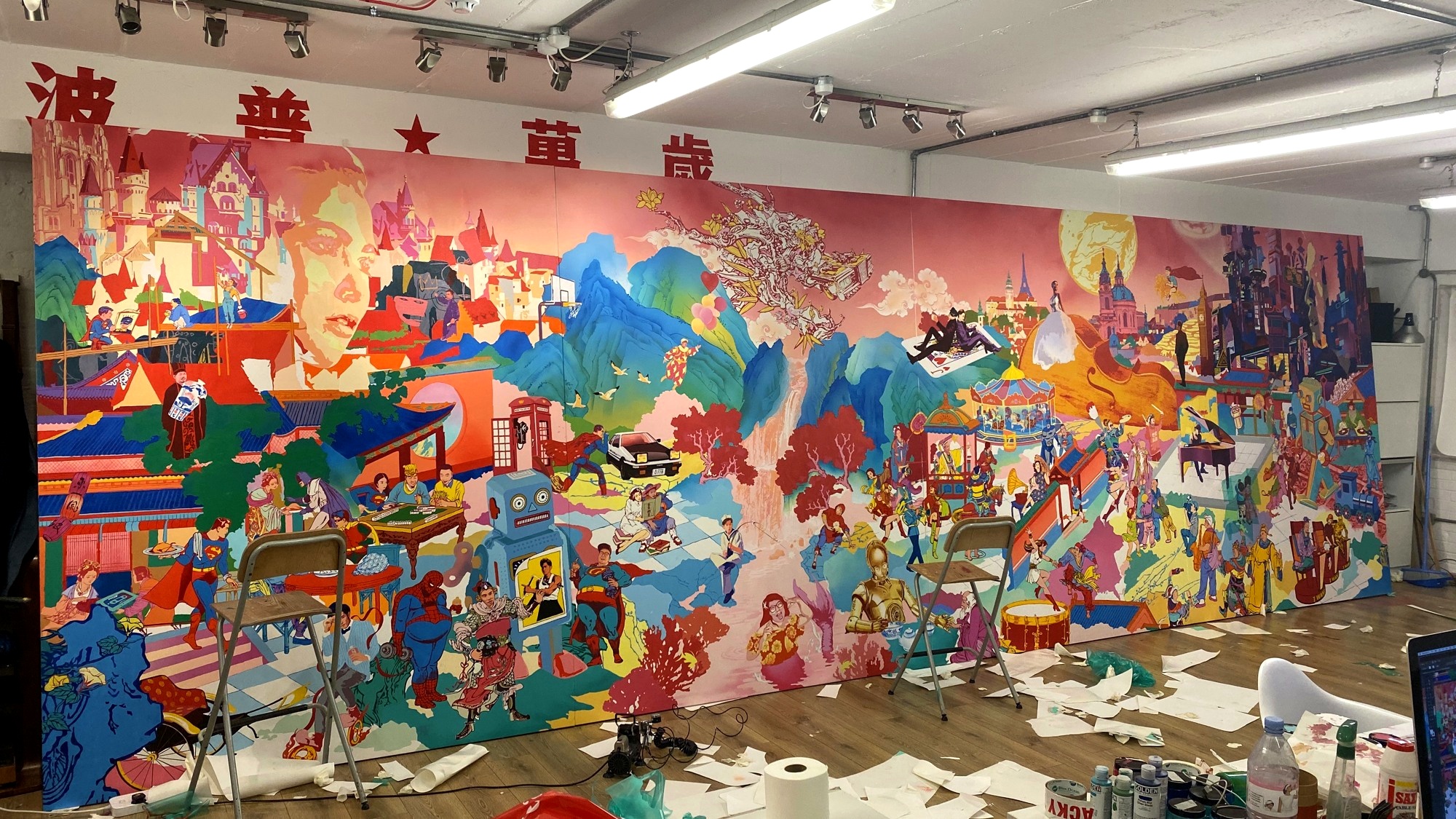 The painting in progress in the studio