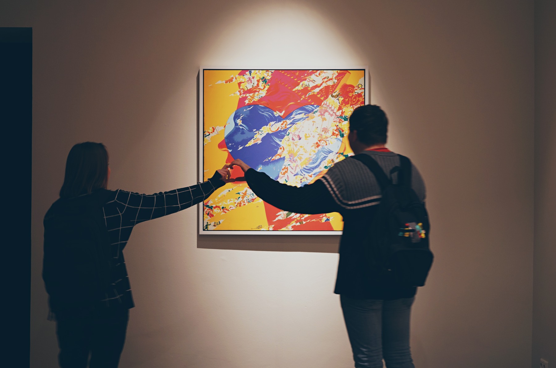 Visitors share a moment in front of Tsai’s work at MMOMA.