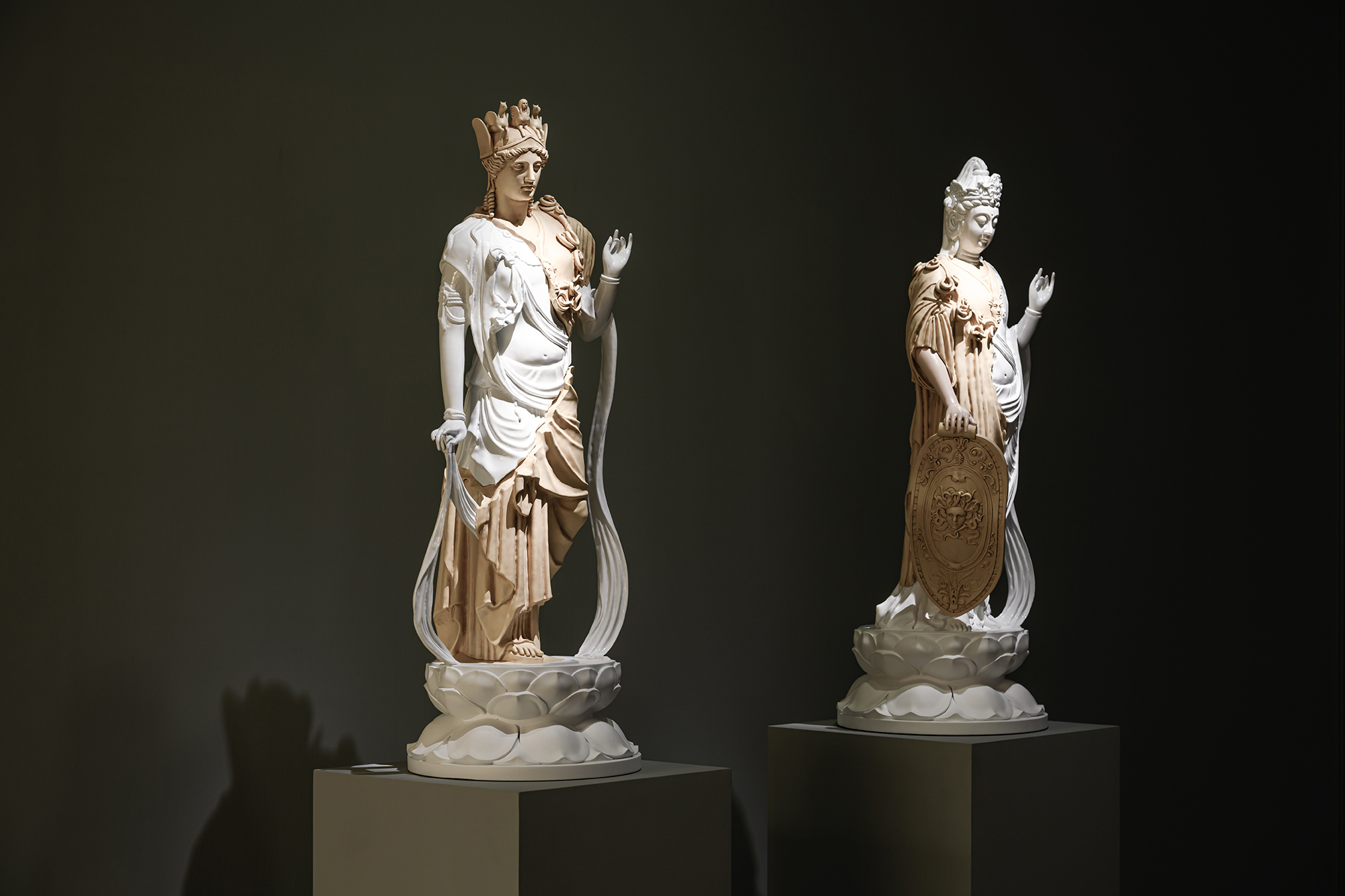 Sculptural figures combining Eastern and Western imagery